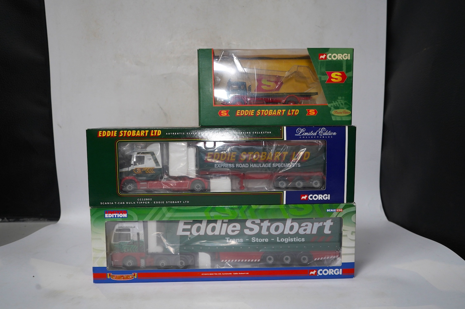 Thirteen boxed diecast Corgi Eddie Stobart commercial vehicles, including; tractor and trailer units, a Scammell Contractor Wrecker, flatbed lorries, curtainside lorries, etc. Condition - good.